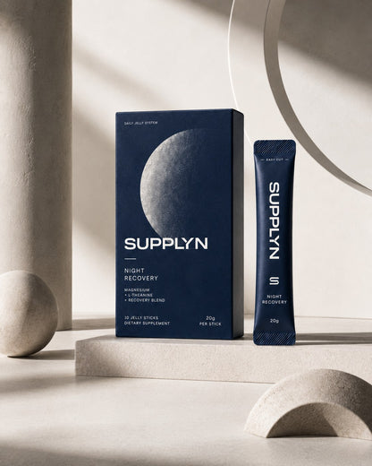 Supplyn Night Recovery navy box and jelly stick on a stone plinth